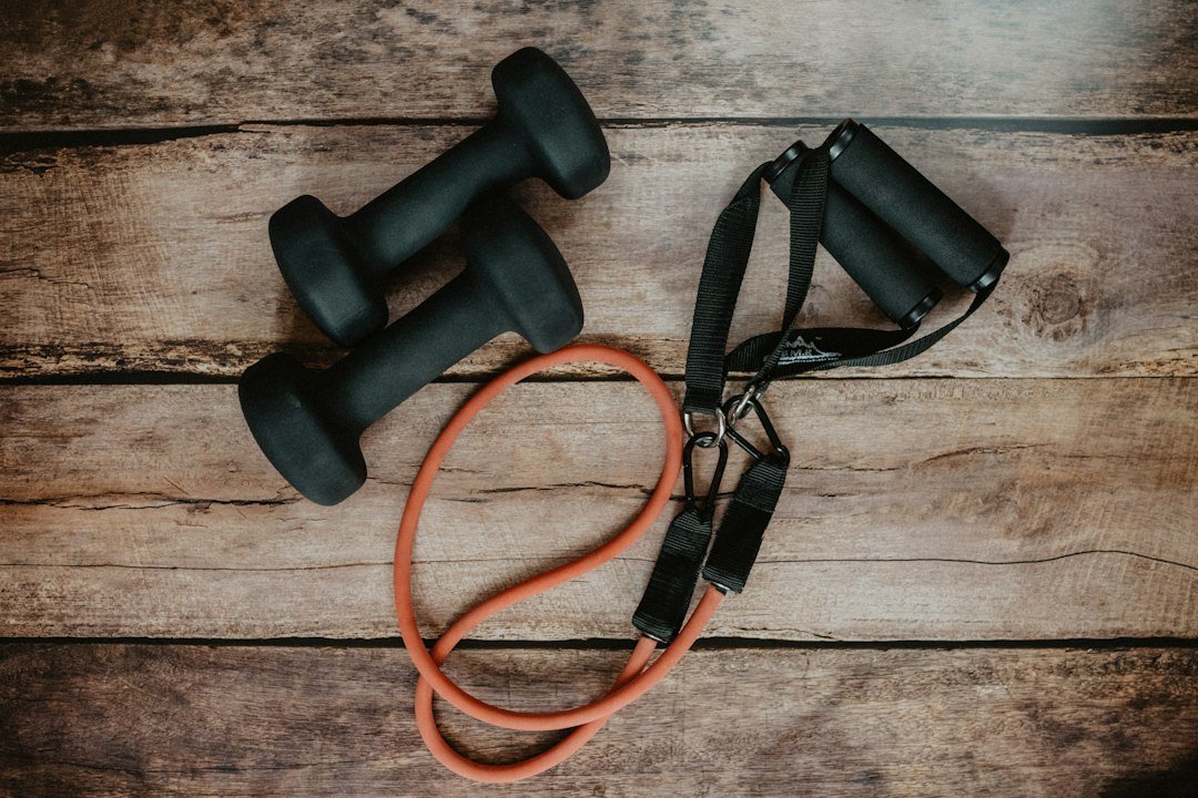 Dumbbells and resistance-training equipment arranged on a gym floor